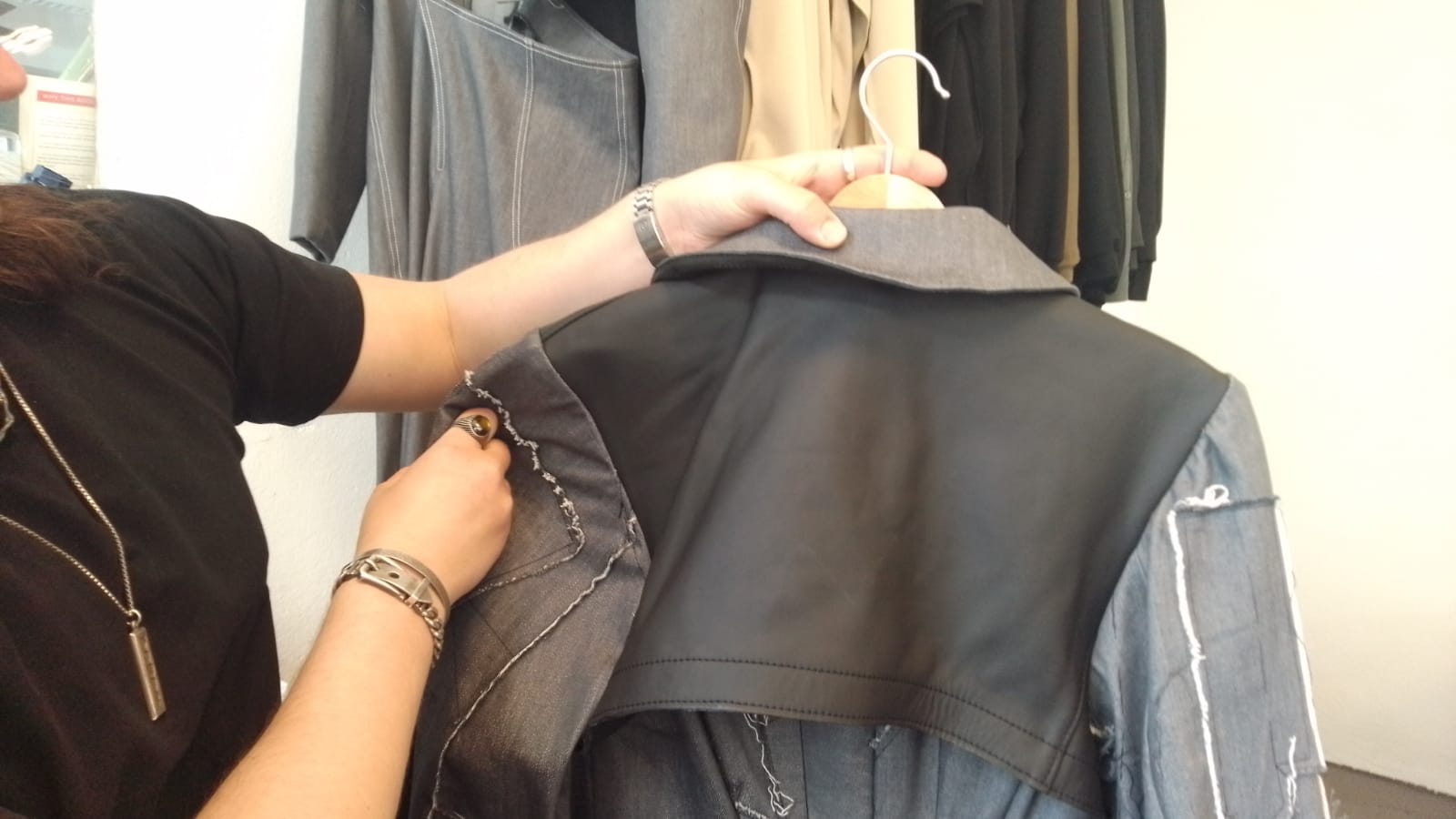 Peralta leather-and-denim jacket showroom detail